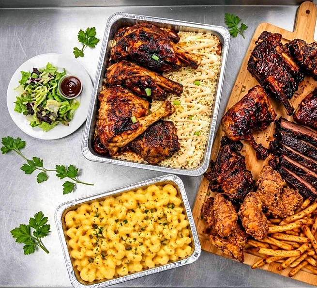 Halal BBQ spread of ribs, sliced brisket, smoked chicken quarters on rice, fried chicken, fries, mac and cheese and salad