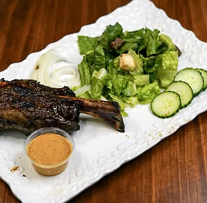 Smoked lamb shank with salad